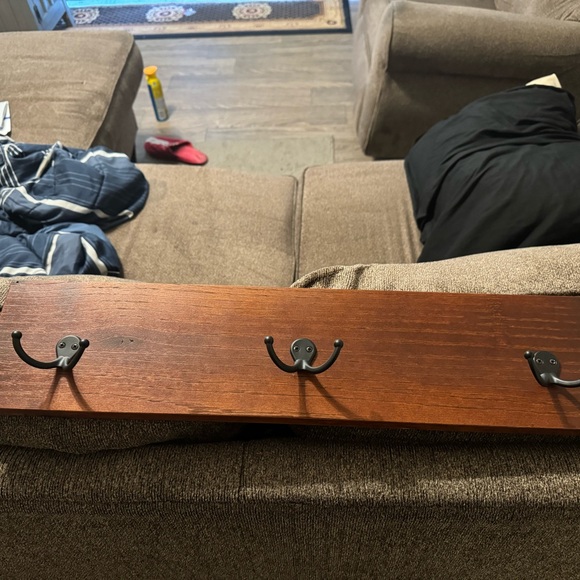 Homemade handcrafted wall mounted coat racks.